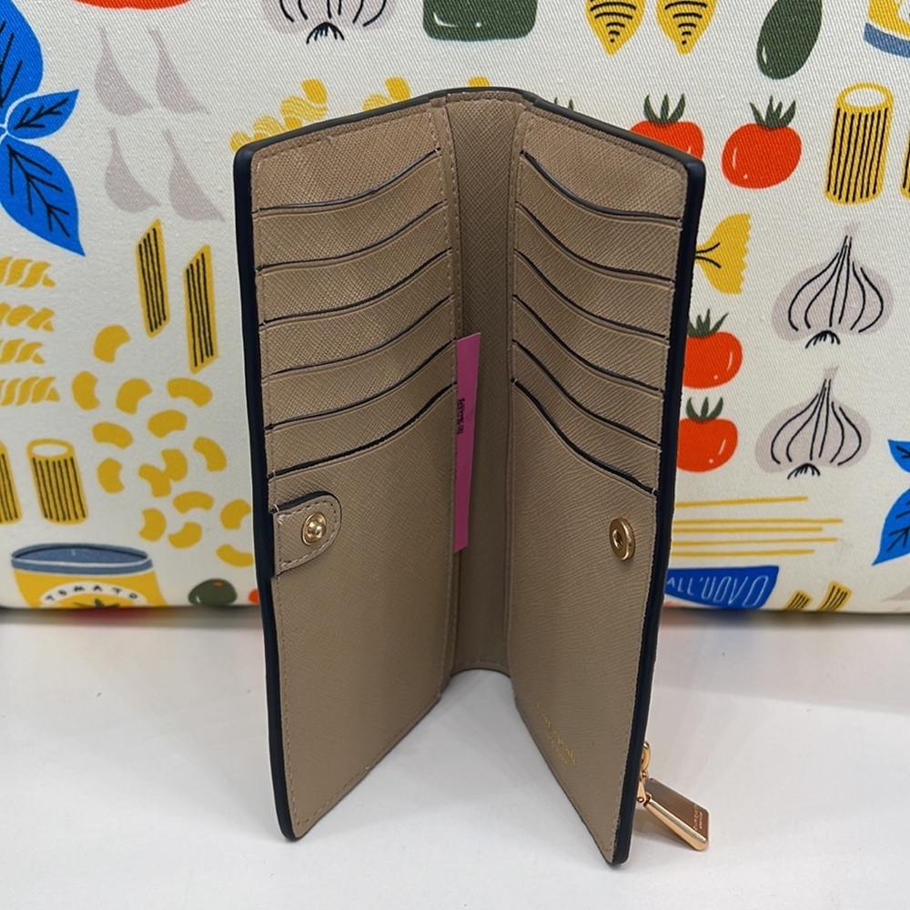Kate Spade Morgan Colorblocked Slim Bifold Wallet Cafe Mocha
NWT - Picture 7 of 16